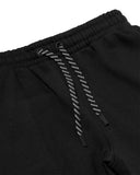 Black sweatpants with drawstring on a white background