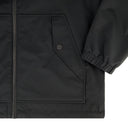 Close-up of a black jacket with a buttoned pocket on a white background
