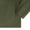 Close-up of a green raincoat with a white background