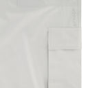 Close-up of a light gray fabric with 'Spyder' branding on a white background